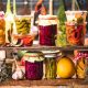 Pickled Marinated Fermented vegetables on shelves in cellar