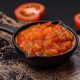 Red hot or spicy sauce with chili peppers, tomatoes, garlic, spices